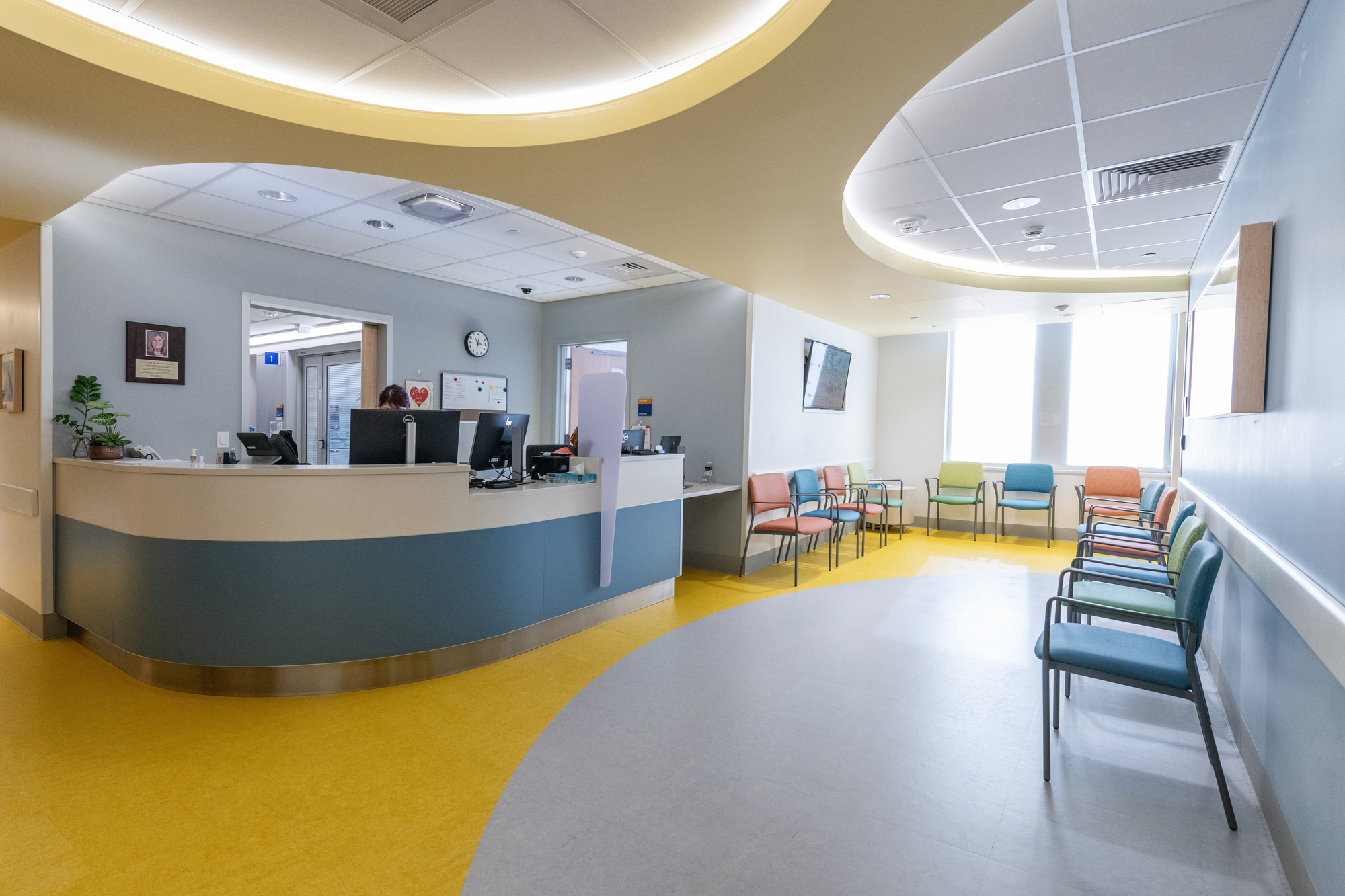 Reception desk and waiting area at Infusion and Day Treatment Program in Waltham