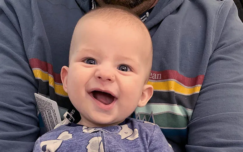 A picture containing human face, baby, child