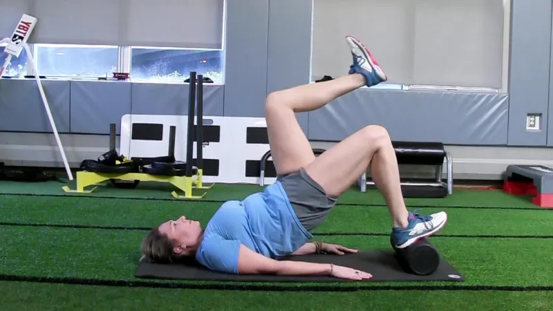 A woman does stretches before running.